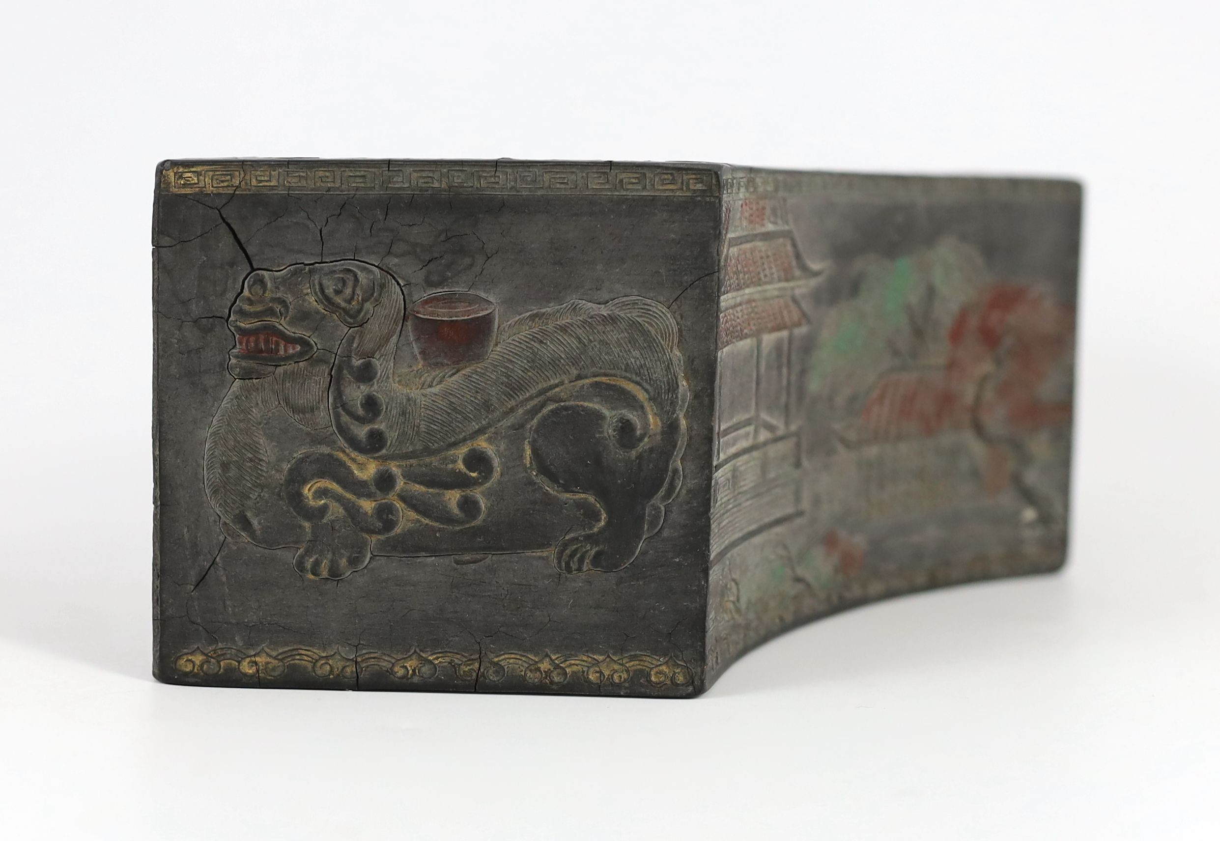 A Chinese compressed ink block in the form of a flower pot, Ming mark, Qing dynasty, 25 cm wide